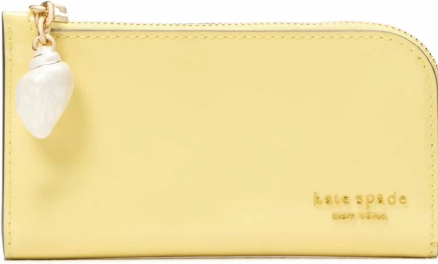 Kate Spade New York Devin Small Slim Bifold Wallet in Patent Leather with Shell Zipper Puller, Yuzu Jam Color