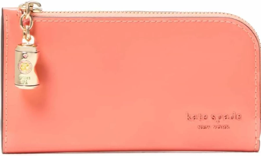 Kate Spade New York Devin Small Slim Bifold Wallet in Pink Moon, Patent Leather with Beer Can Zipper Puller